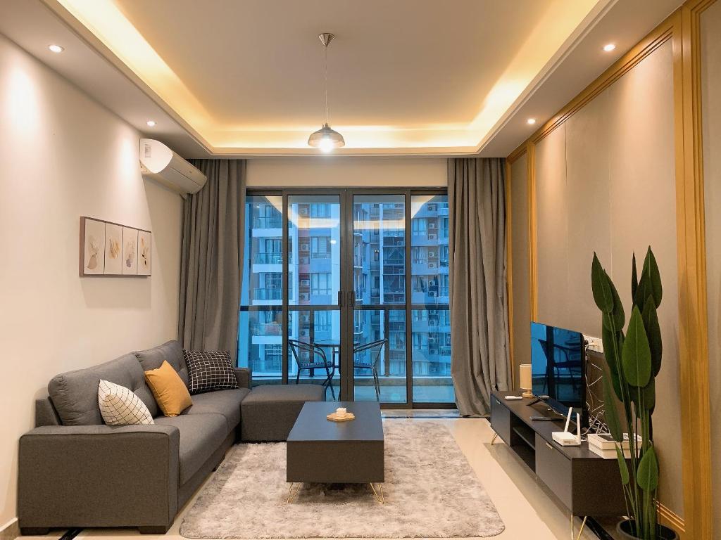 Modern interior of R&F Princess Cove condominium with spacious living area and waterfront views