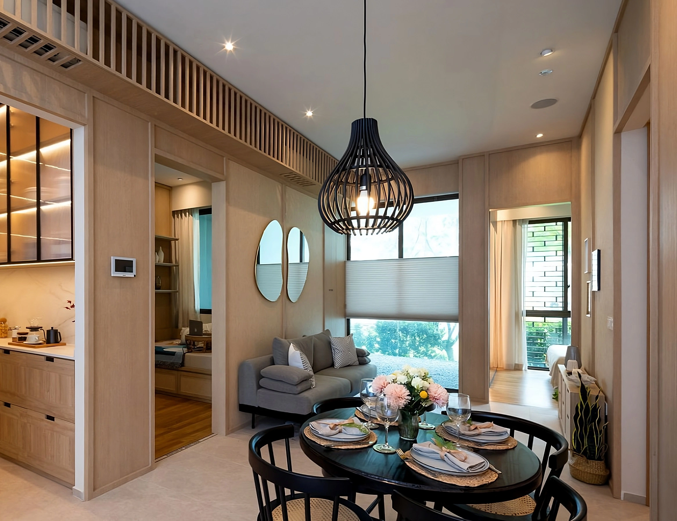 Spacious dining and living room interior at Atlassia condominium with modern design